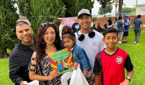 Photo of family at the El Rancho Federation of Teachers Reading Opens the World event