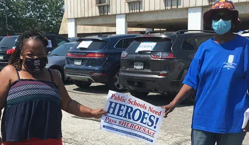Cleveland, OH members with sign