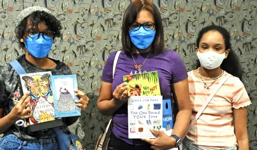 Family at AFTNJ BTS bookfair