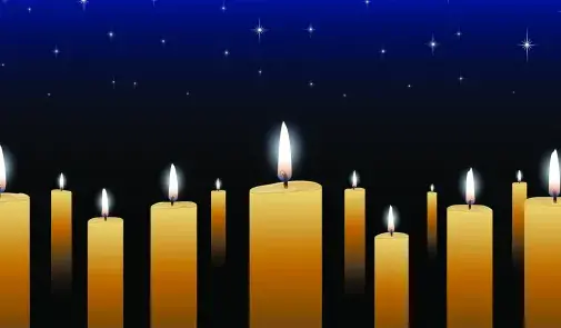 memorial candles with the night sky in the background