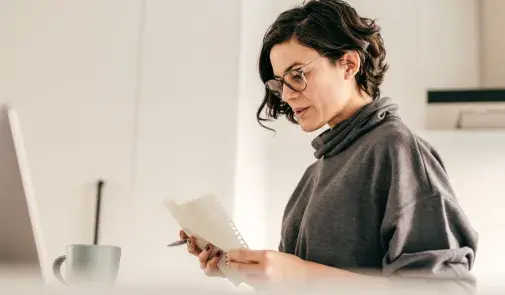 Woman reading report