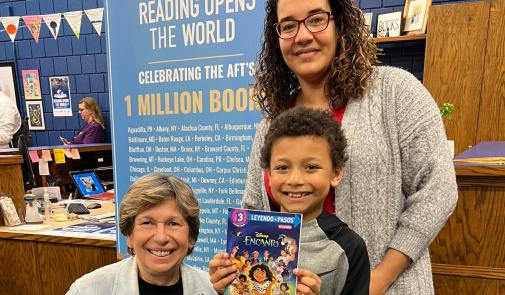 Jayveon, a 3rd grader at Cloud Elementary with his mother, Victorya and AFT President, Randi Weingarten at a Reading Opens the World event with AFT Kansas and United Teachers of Wichitaw.