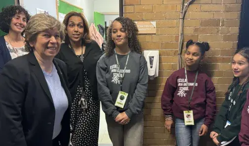 Weingarten, left, with student leaders and staff at Sarah Greenwood School in Boston on April 11.