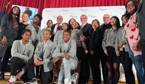 Photo of Randi Weingarten and students at the announcement of a new health sciences high school in Queens, N.Y.