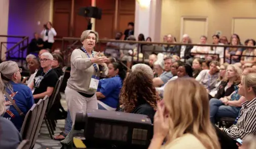 AFT President Randi Weingarten speaking in a crowd