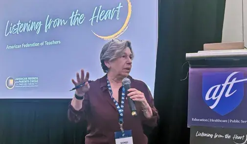 AFT President Randi Weingarten in front of a screen