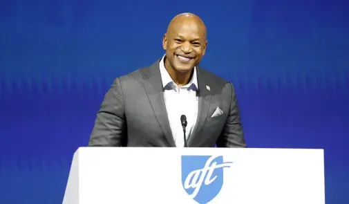 Maryland Gov. Wes Moore addresses the AFT convention from behind the podium.