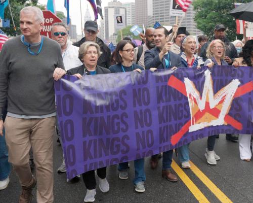 no kings march, banner with Randi