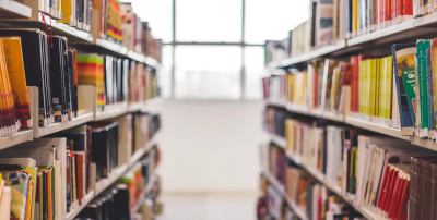 Photo of library shelves. Photo credit: Thi Soares/iStock/Getty Images Plus