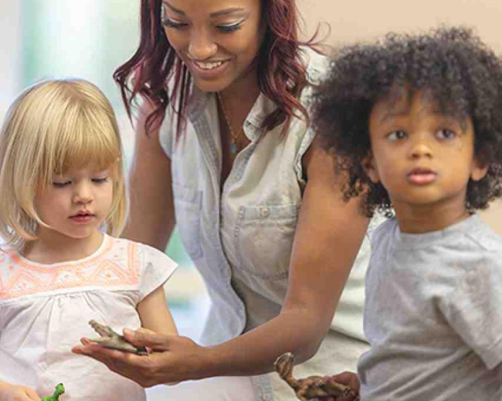 Woman and two young children