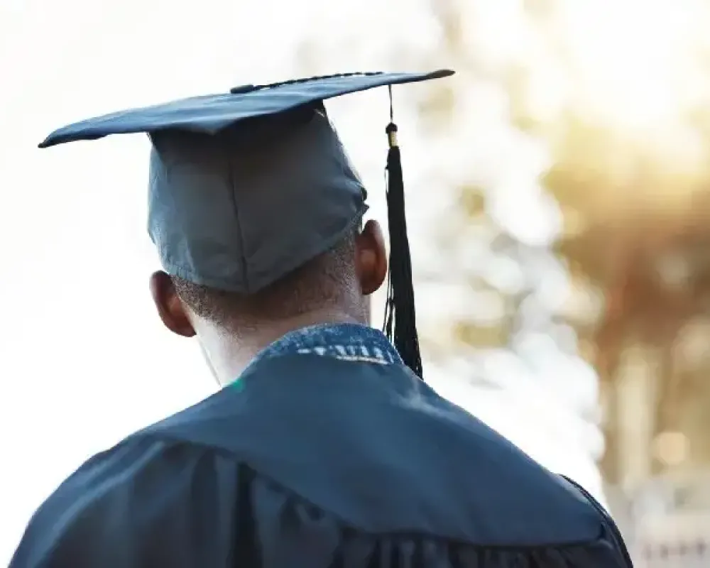 Photo of a graduate from behind