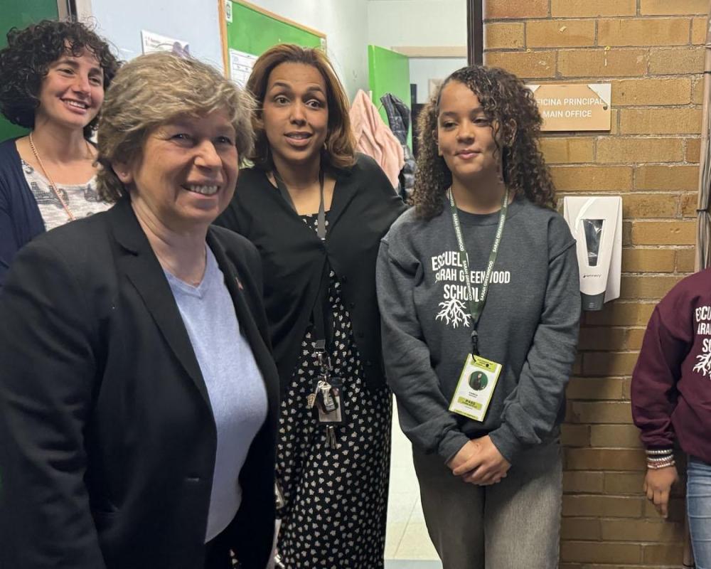Weingarten, left, with student leaders and staff at Sarah Greenwood School in Boston on April 11.