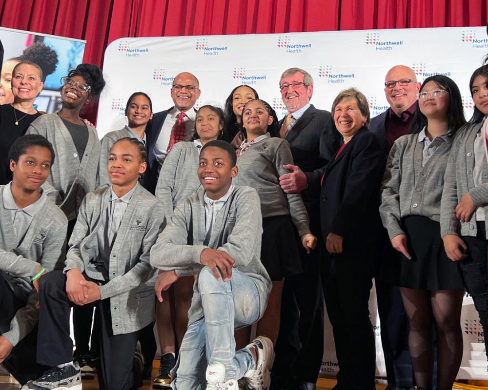 Photo of Randi Weingarten and students at the announcement of a new health sciences high school in Queens, N.Y.
