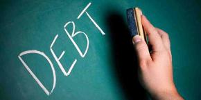 chalkboard says debt