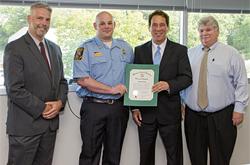 Morris receiving a citation from Baltimore County for his AFT Everyday Hero nomination.