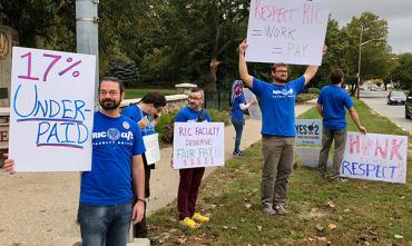 Sign holders at Rhode Island College