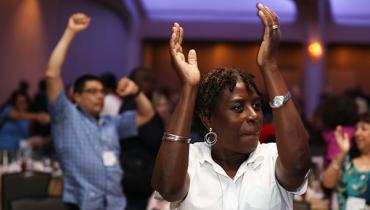 audience cheers on while Marc Brackett speaks at TEACH 2019