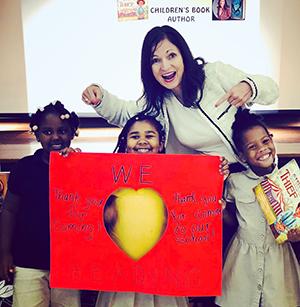 Author Alane Adams with students