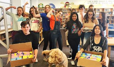 first book workers pose proudly