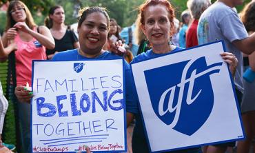 AFT members rally at vigil