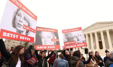 posters at Janus rally