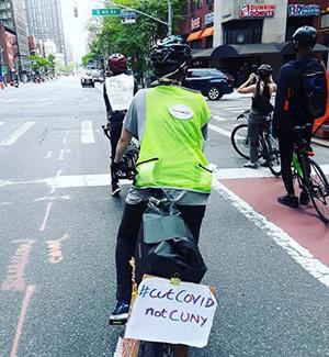 person on bike at rally