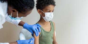 Child receiving vaccine