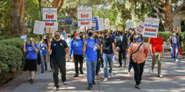 UC-AFT picketers