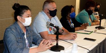 Panel at community schools breakfast