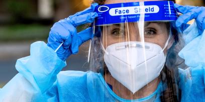 Nurse with face shield