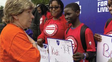 Randi Weingarten meets with students at March For Our Lives rally.