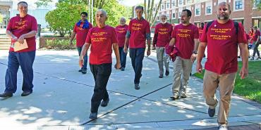 Men marching at Rider University