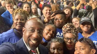Raphael Warnock with supporters