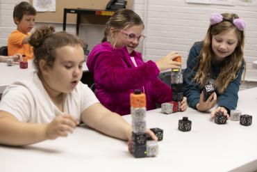 Photo of students doing hands-on project in class