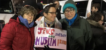 Photo of AFT President Randi Weingarten and others holding a sign that reads "Jews Support Our Muslim Friends"