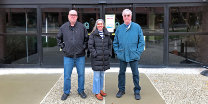 From left, John Sheridan, Kathi Knight and Michael Hennessey outside Grupp Hall.