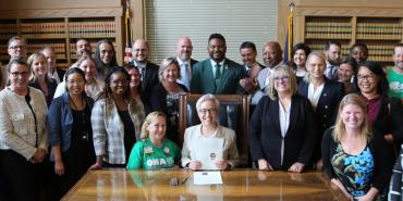 Photo of Oregon Gov. Tina Kotek with ONA and OFNHP members