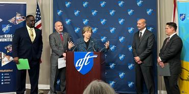 AFT President Randi Weingarten at a podium talking about the Innovation Fund