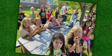 Photo of students during a hands-on lesson about planting seeds.