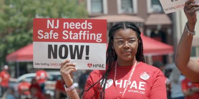HPAE member with safe staffing sign