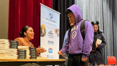 Award-winning and banned author Elizabeth Acevedo signs books for high school students in Washington, D.C. 