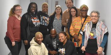 Boston Teachers Union members organized a screening of On These Grounds; director Garrett Zevgetis is fourth from right.