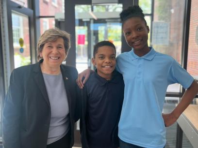 AFT President Randi Weingarten with two students