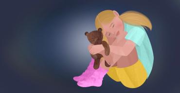 a young White girl holding a teddy bear is curled up in front of a dark background