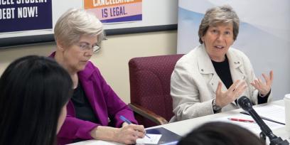 Weingarten, right, with Sen. Elizabeth Warren at a discussion in Boston on March 18 about the student debt crisis.  Credit: Adam Derstine