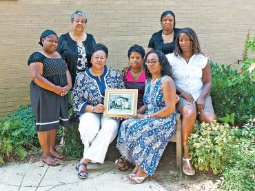 Friends and colleagues of Hilda Taylor, one of the Washington Teachers' Union members killed in the plane that crashed into the Pentagon. Credit: Michael Campbell