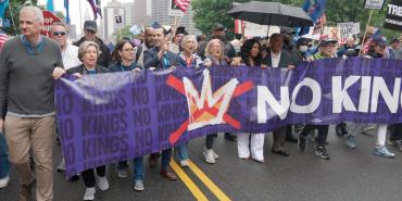 no kings march, banner with Randi