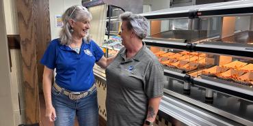 AFT Tulsa President Nancy Leonard, left, and food service manager Ginnie Holly worked closely to bring school meals back in-house.