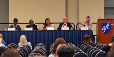 Panelists speak at the AFT Teachers divisional meeting.