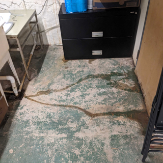Water leaks into offices, causing major damage.